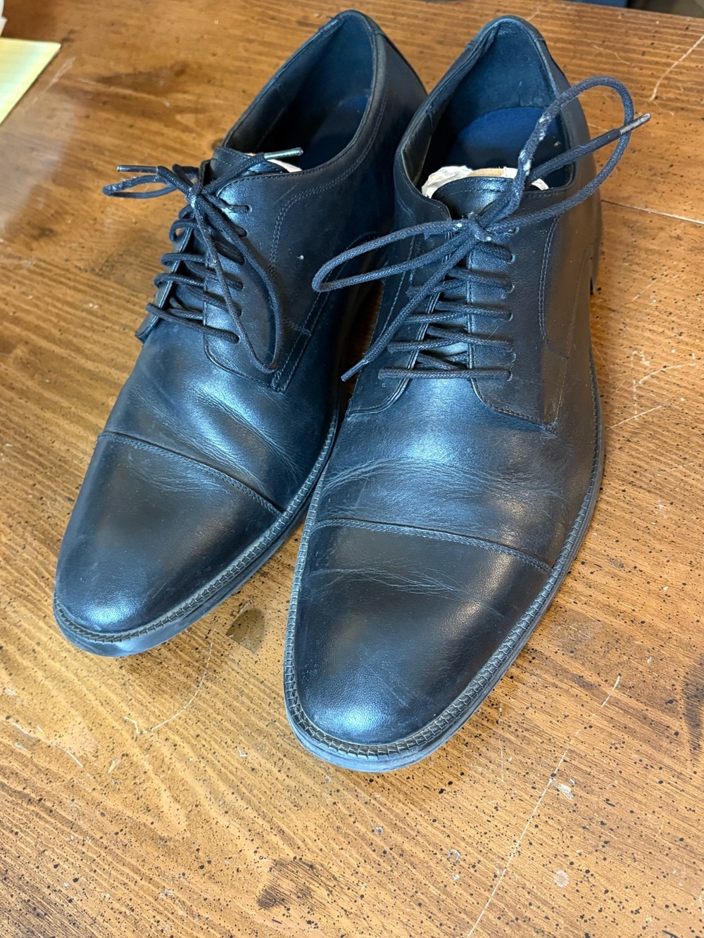 Cole Haan black leather cap toe oxfords